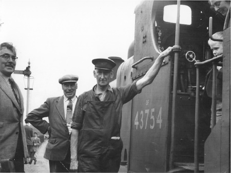 The end of an era. Driver Jim Workman stands by<br>his cab at Tewkesbury Station (Harry Workman)